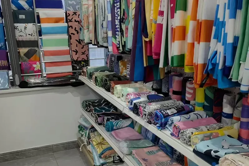 Colorful towel samples showing product, material, and pattern options