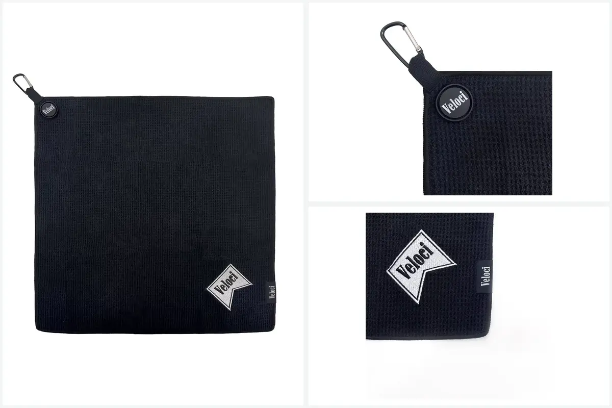 Waffle golf towel with carabiner, custom hanging badge, embroidered patch, and woven side label