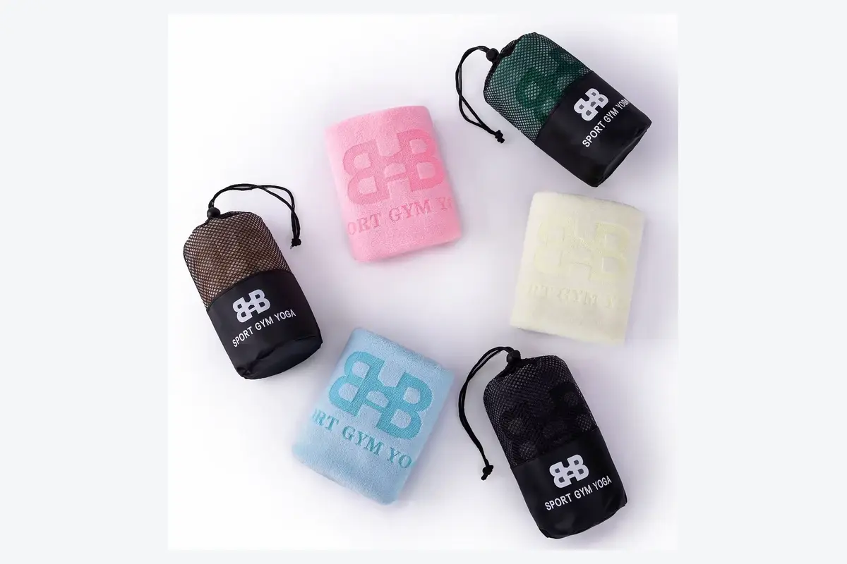 Golf towels packed individually in compact mesh carry pouches
