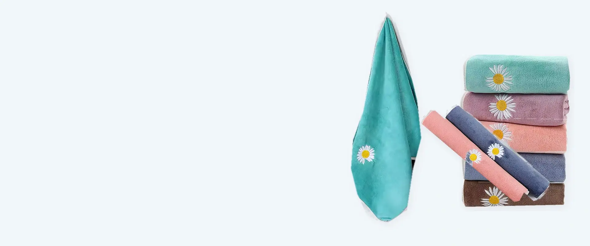 Custom embroidered hand towels in folded, rolled, and hanging styles
