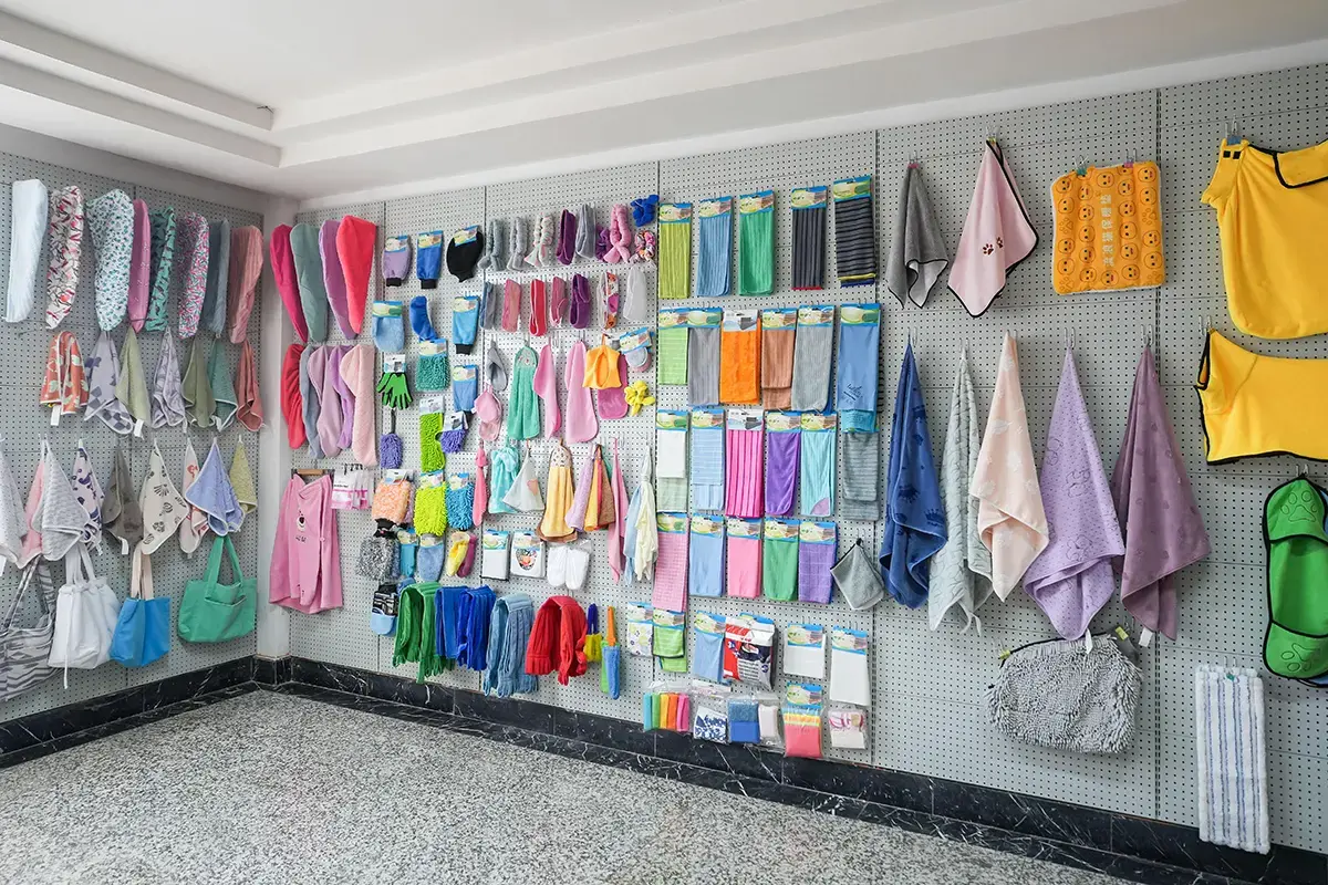 Towel sample room wall displaying colors, sizes and finished product references