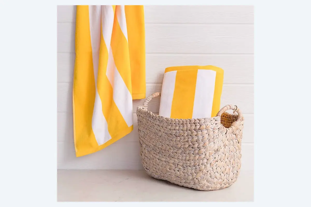 Striped cotton pool towels arranged for hotel and spa use