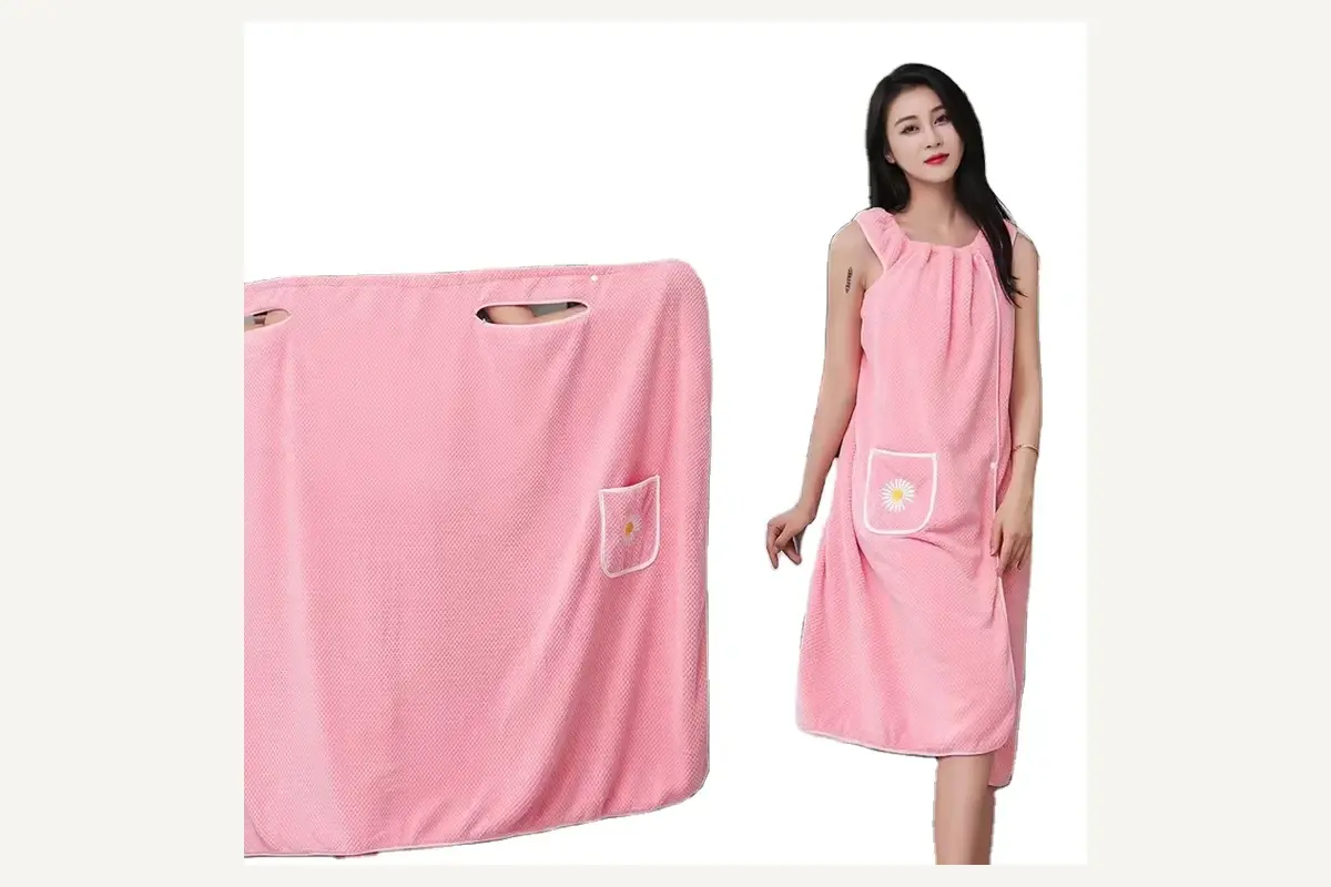Pink wearable spa wrap towel for body treatments and guest coverage