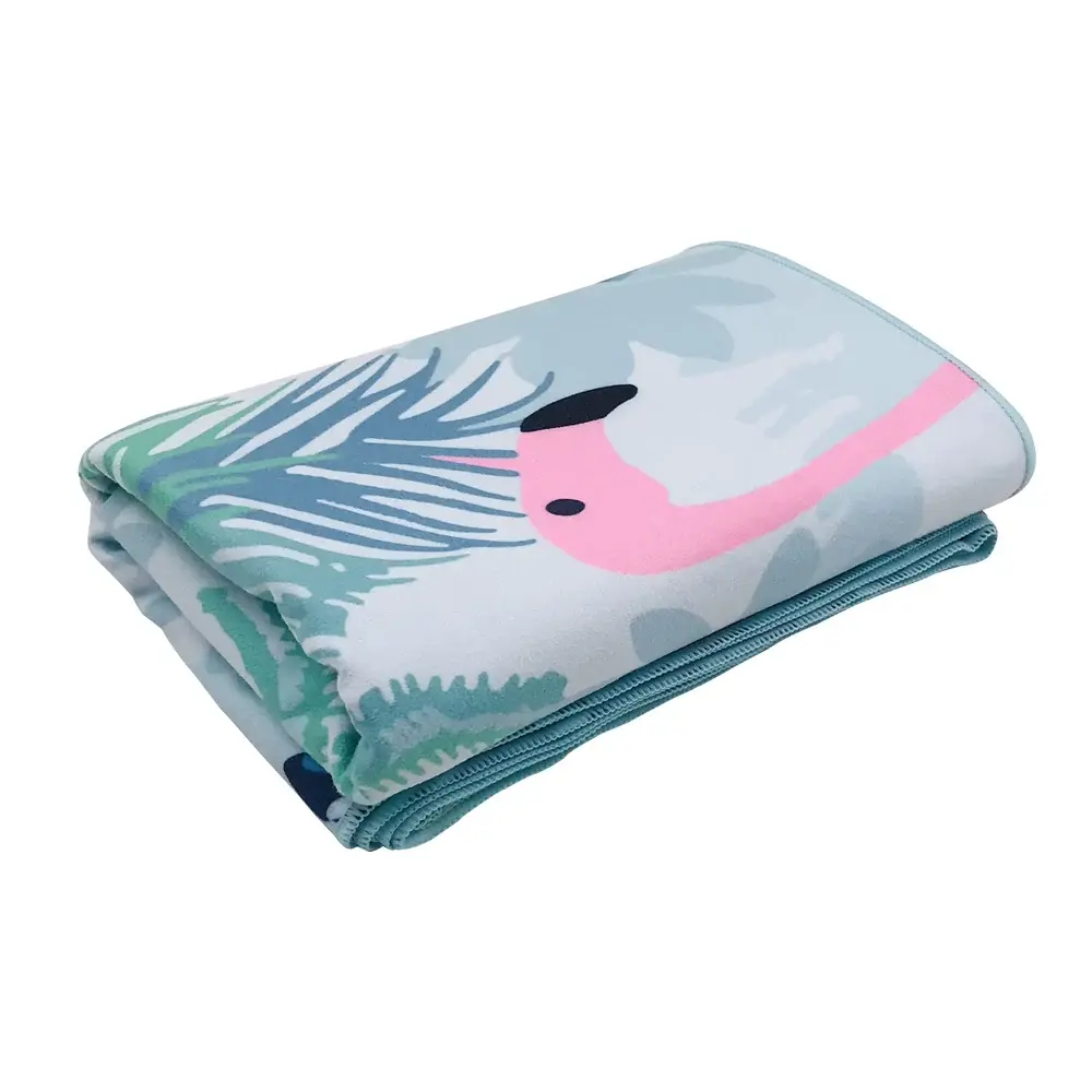 Folded tropical flamingo beach towel with full-color print