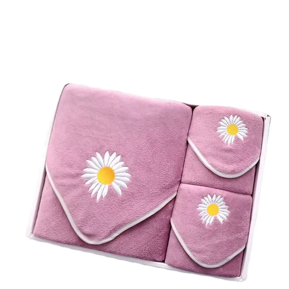 Pink hand towel set with embroidered daisy details