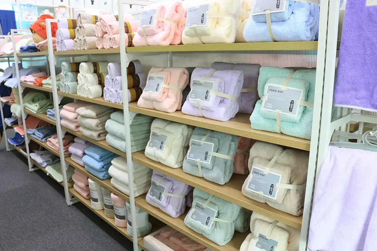 Packaged towel samples organized for finished dimension specification