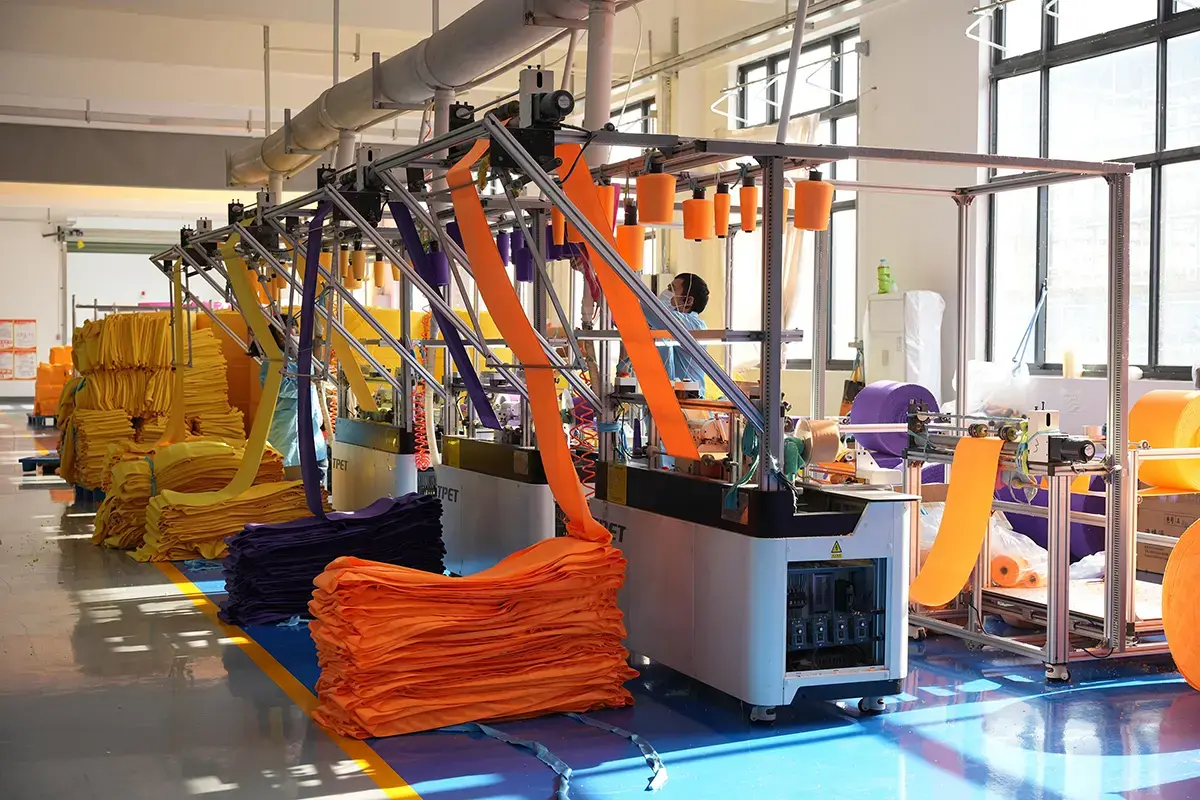 Colored towel panels moving through production for woven color comparison