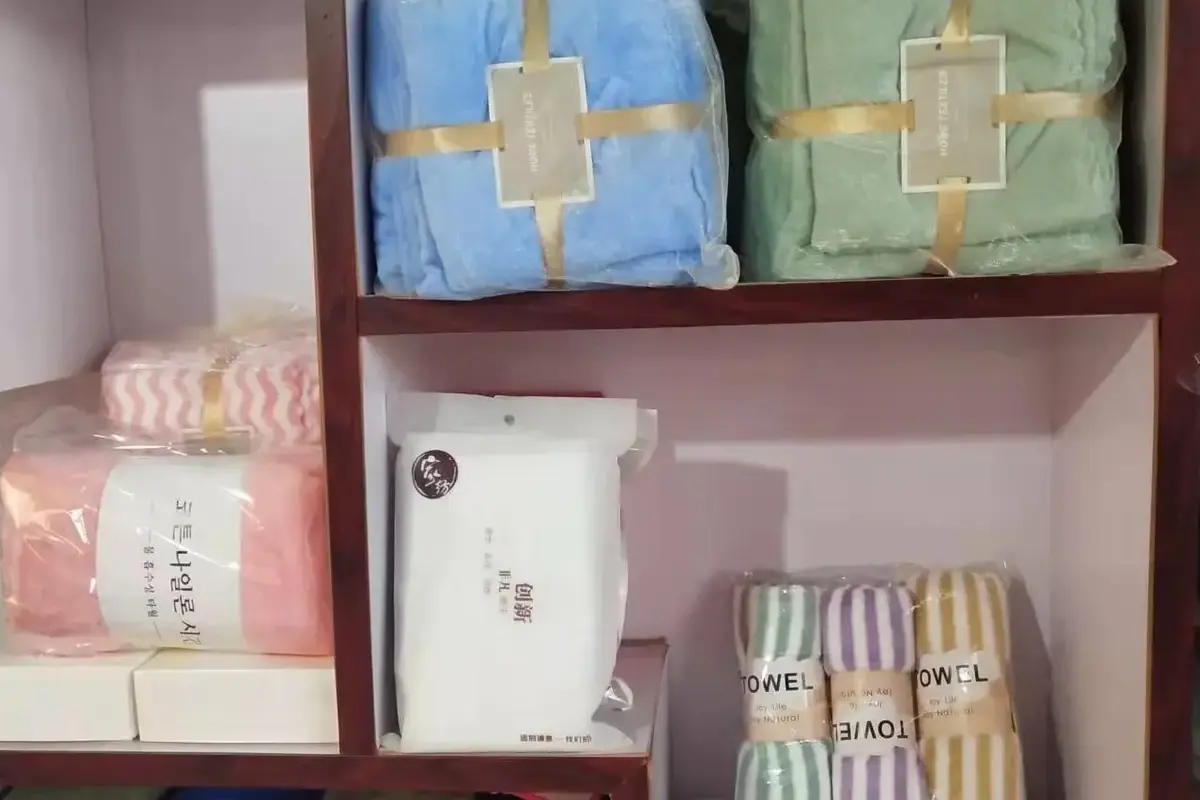 Loaded towel packages with bands, bags, and boxes displayed for approval