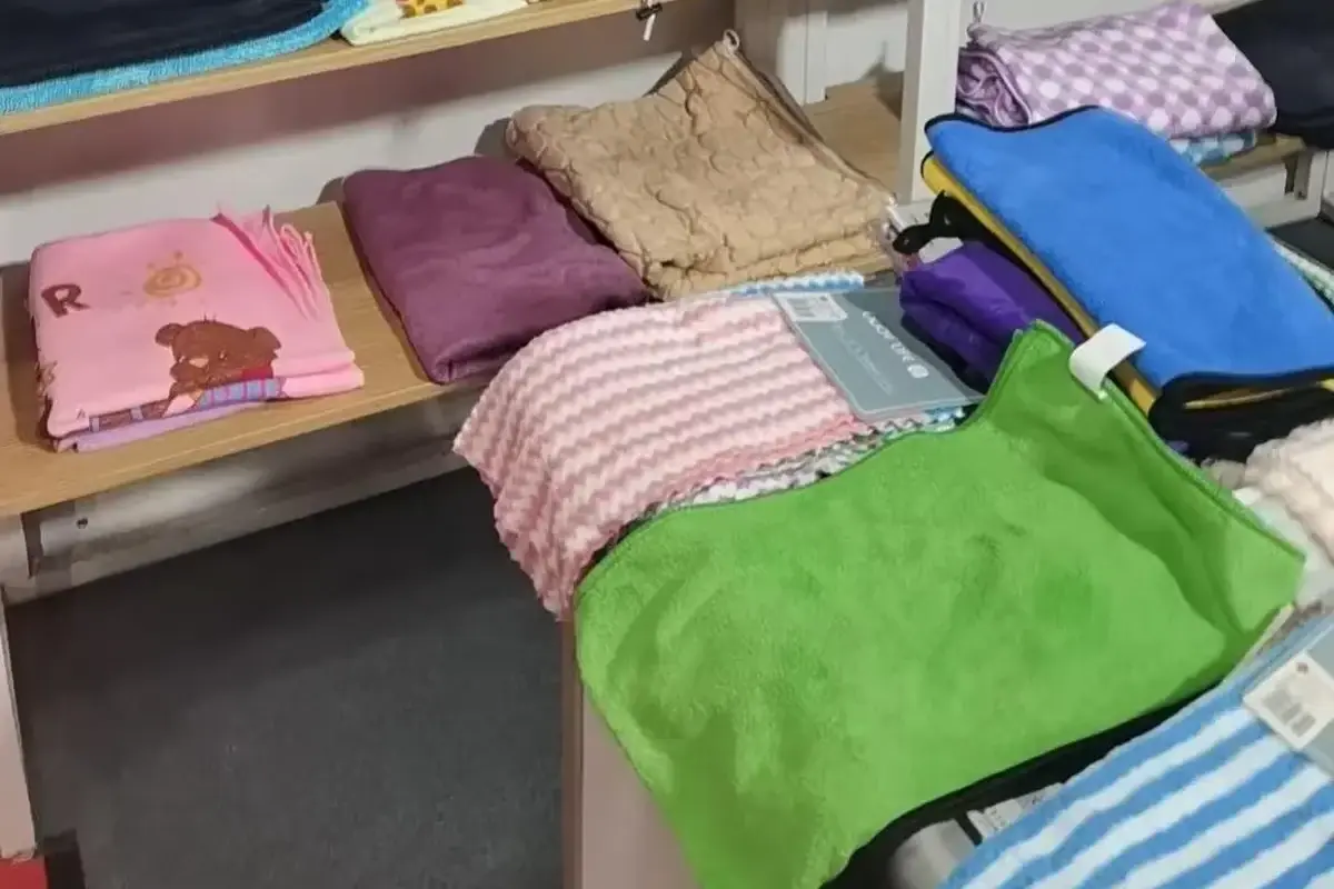 Printed and solid towel fabric samples compared for surface compatibility