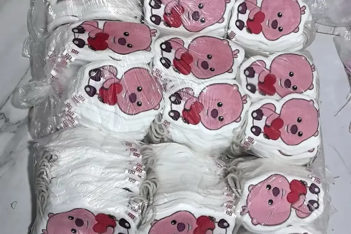 Individually wrapped embroidered towels kept with their product identification labels