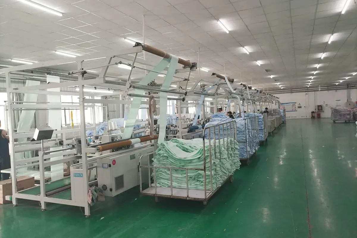 Towel production line and finished batches shown as manufacturing process evidence