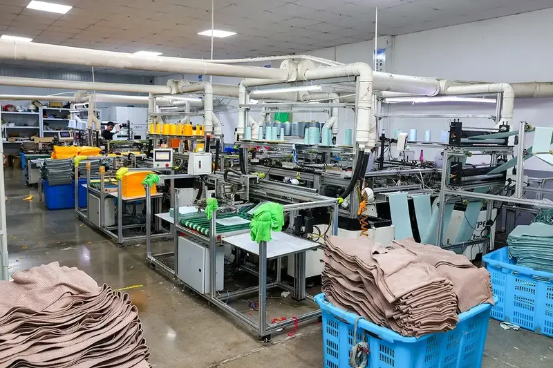 Towel production equipment and finished goods inside the factory